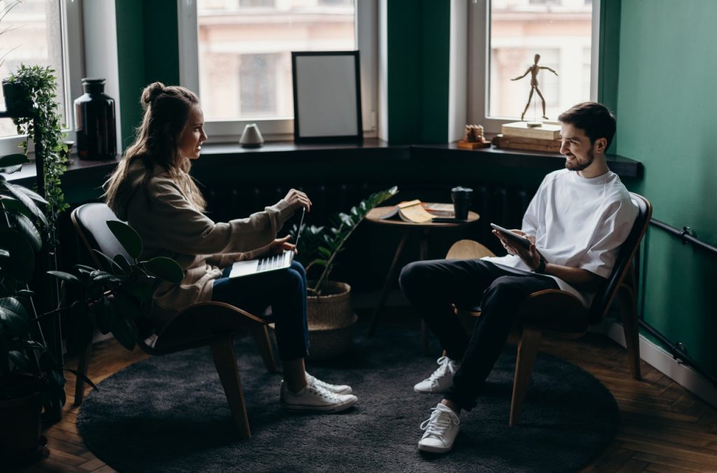 isolation couple sitting in home