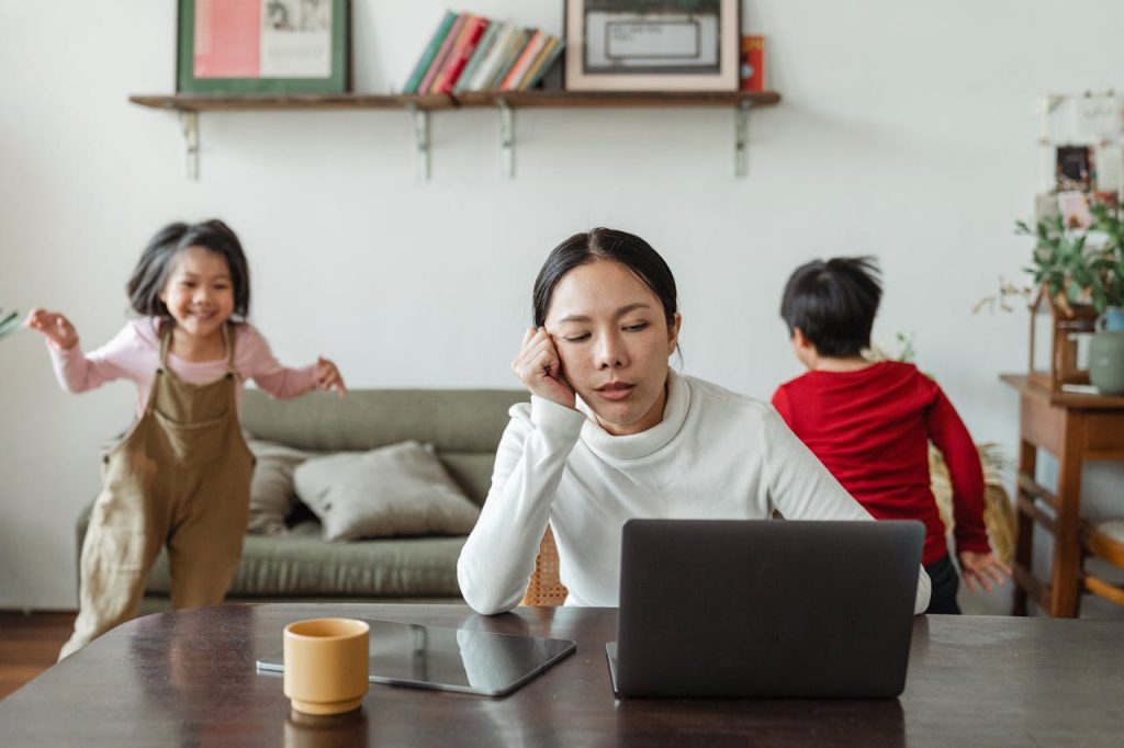 stressed at home working, kids playing, distractions